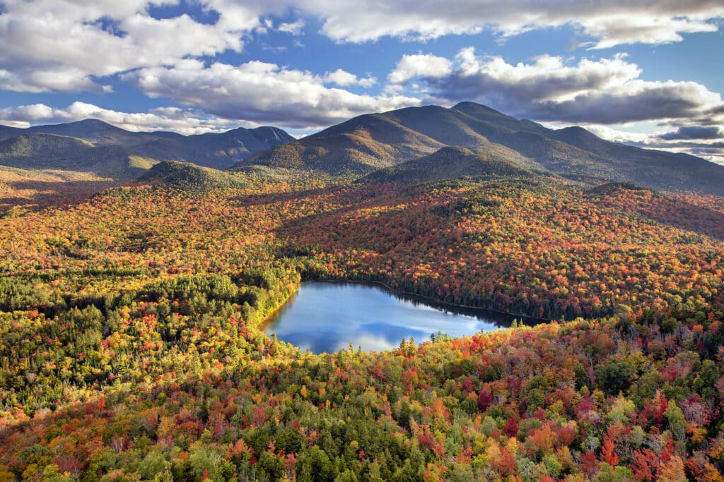 Scenic overlook of Heart Lake from Mt. Jo in the High Peaks area of the Adirondack Mountains in Upstate New York in fall.